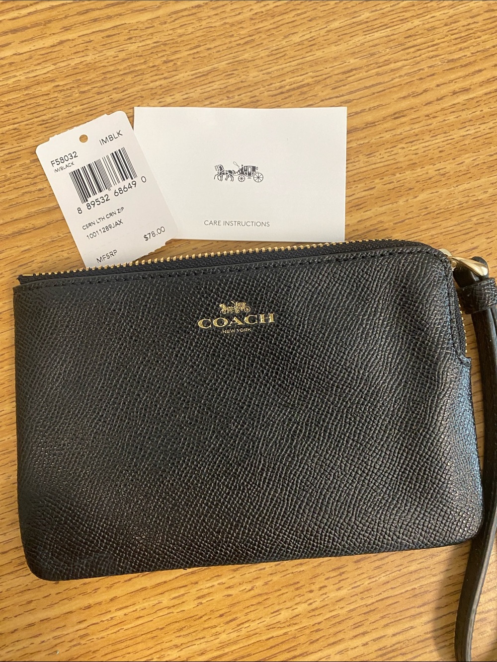 Coach Black Saffiano Leather Wristlet with Gold Logo
